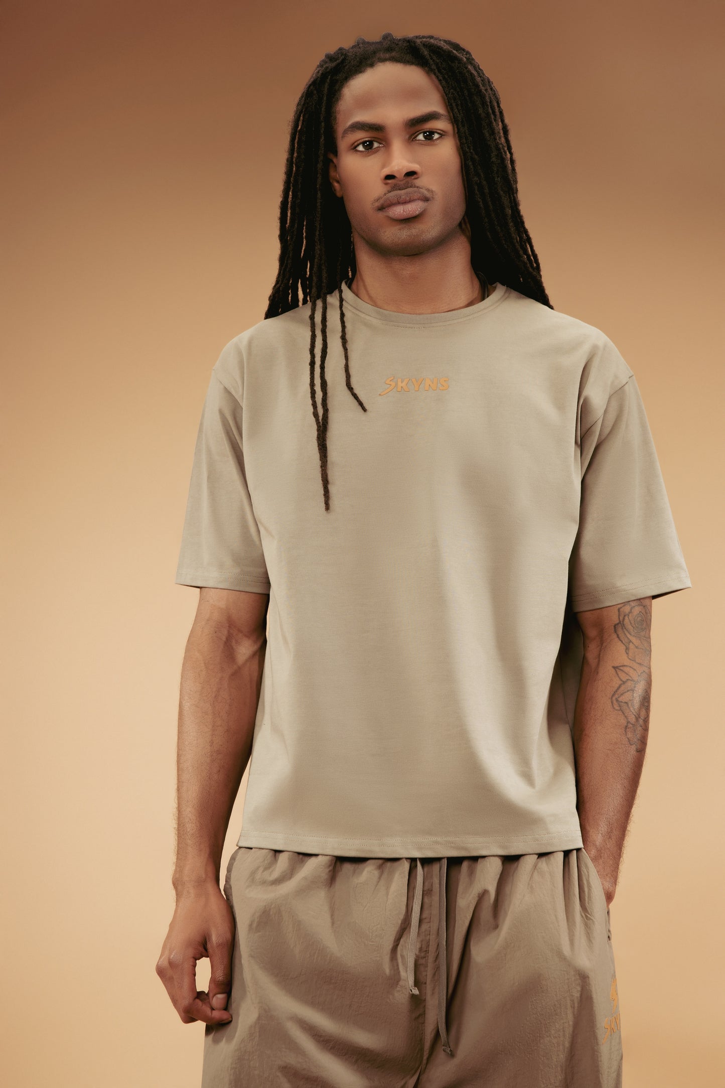 Essential Skyns Tee - Warm Grey